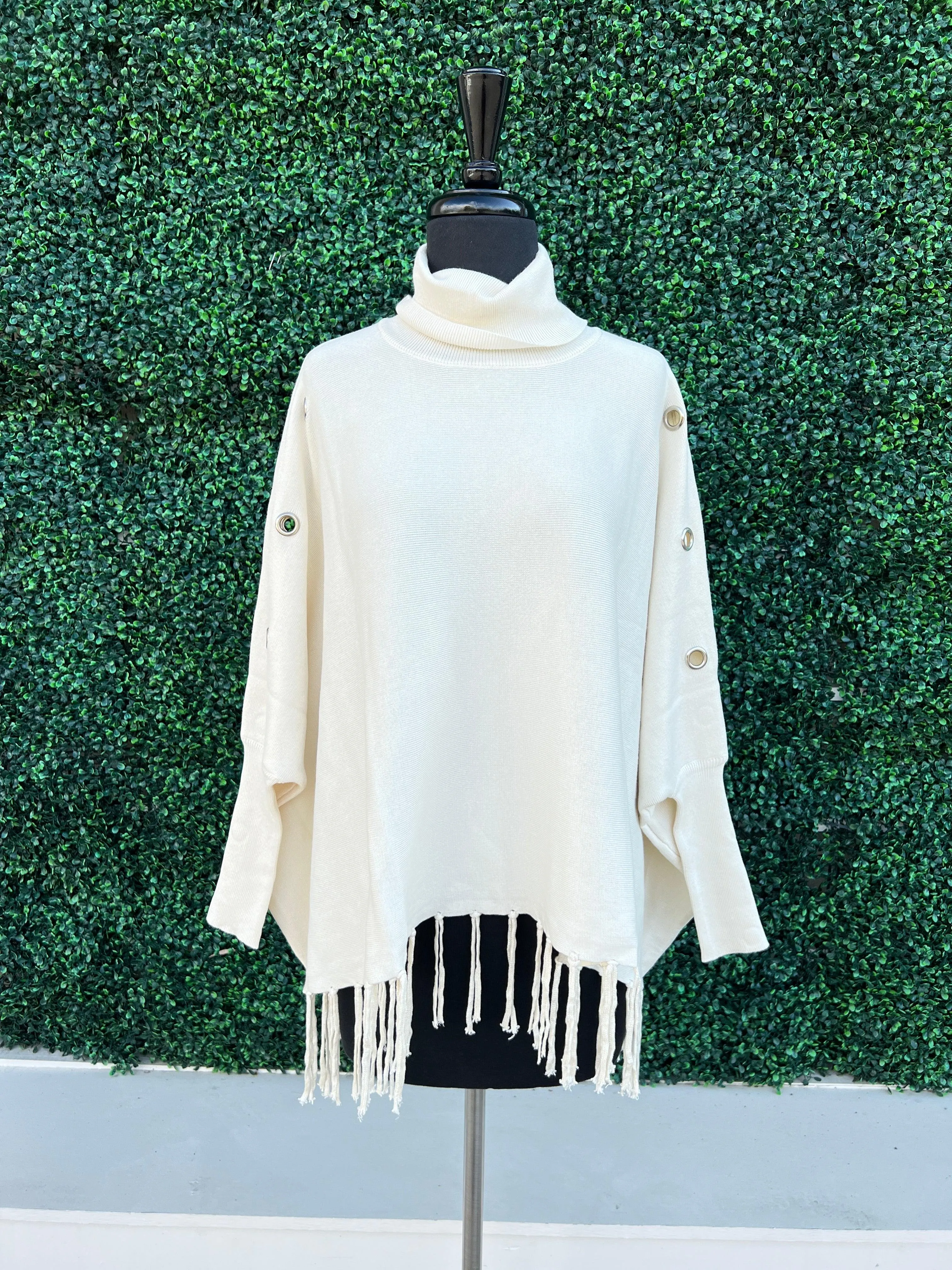 Turtleneck Poncho with Grommets